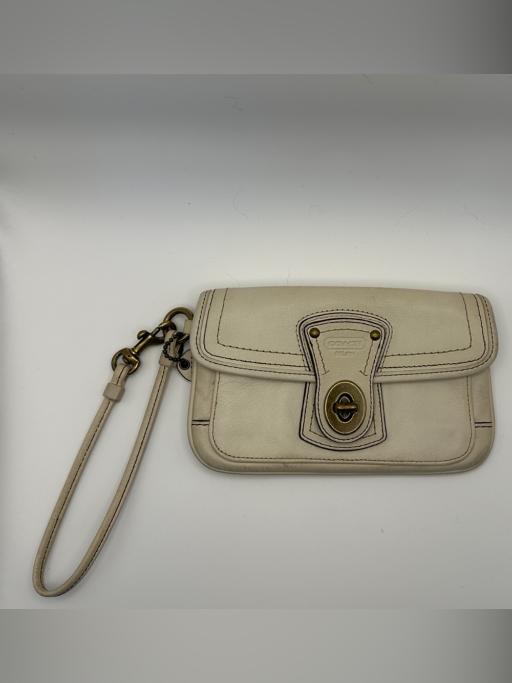 Coach Vintage Cream Leather Wristlet Clutch with Turn-Lock Closure